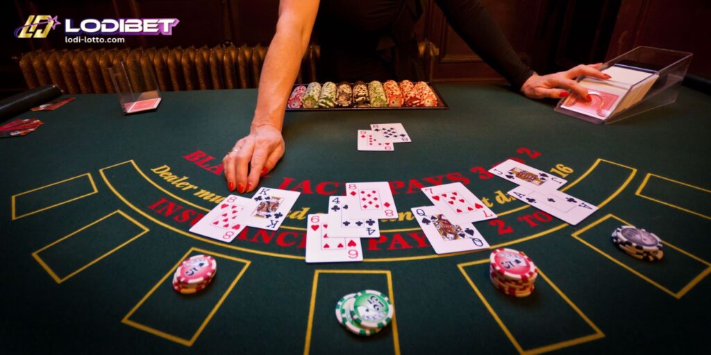 a casino dealer is checking the cards of the players to determine who won